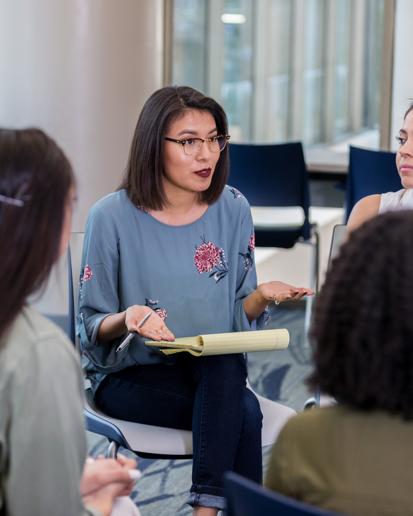 Group therapy session for process addiction recovery with supportive engagement