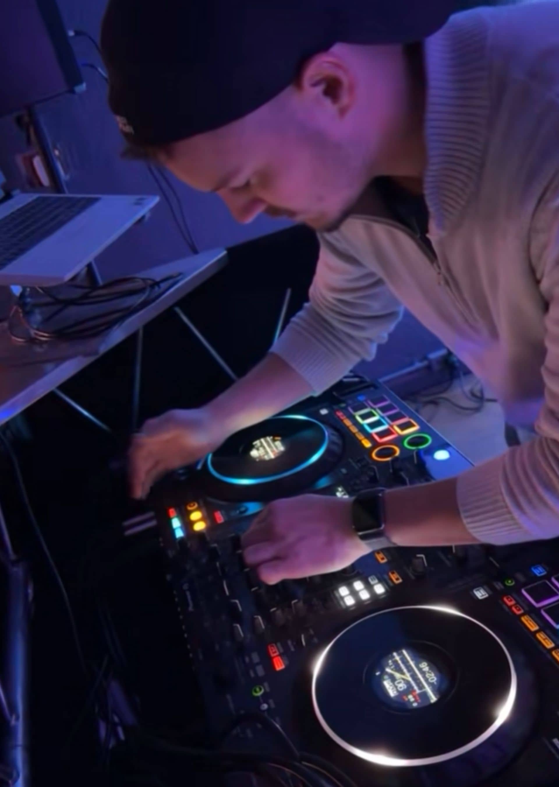 Bierman DJ performing with professional turntables and DJ controller at event