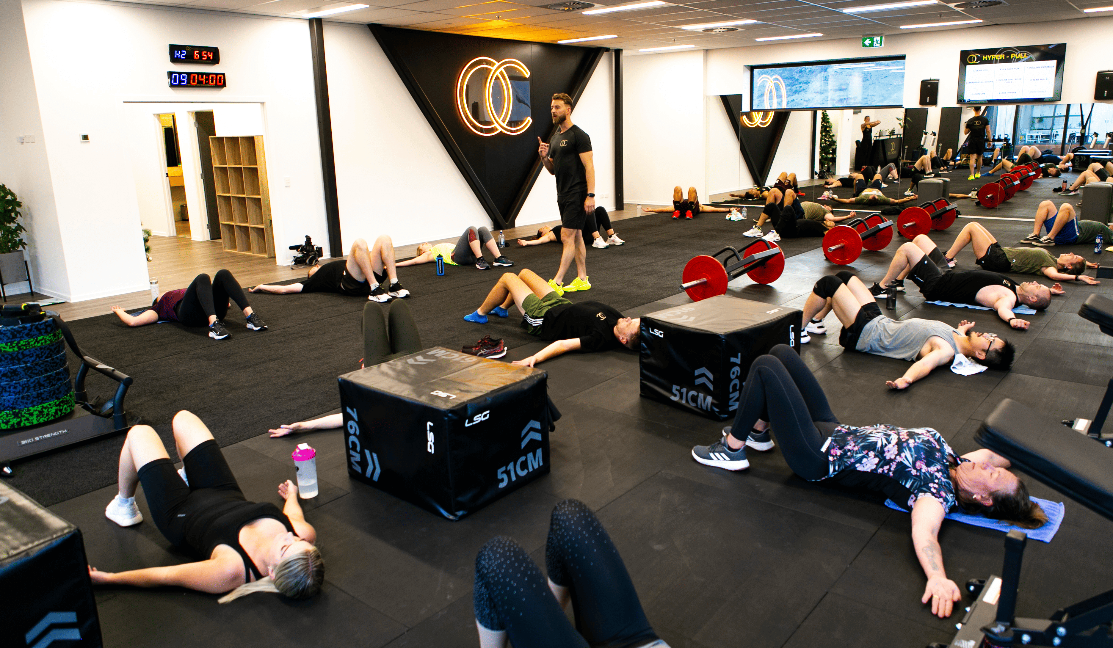 Members training together at OC Health Clubs, community and accountability in action