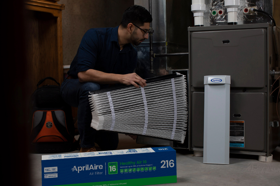 photo of two people doing Furnace Repair & Maintenance