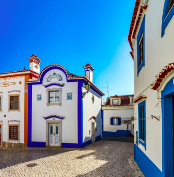 White houses trimmed in blue, central Ericeira