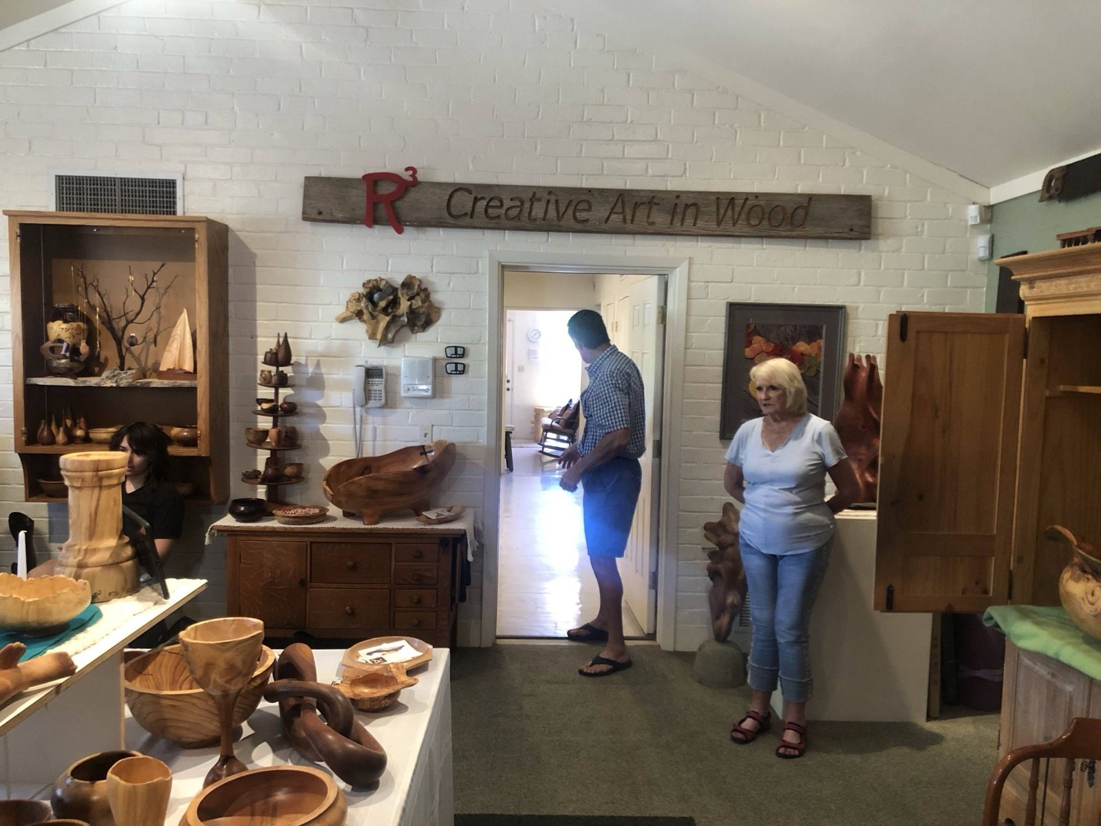 View across the studio and its displayed wood artwork