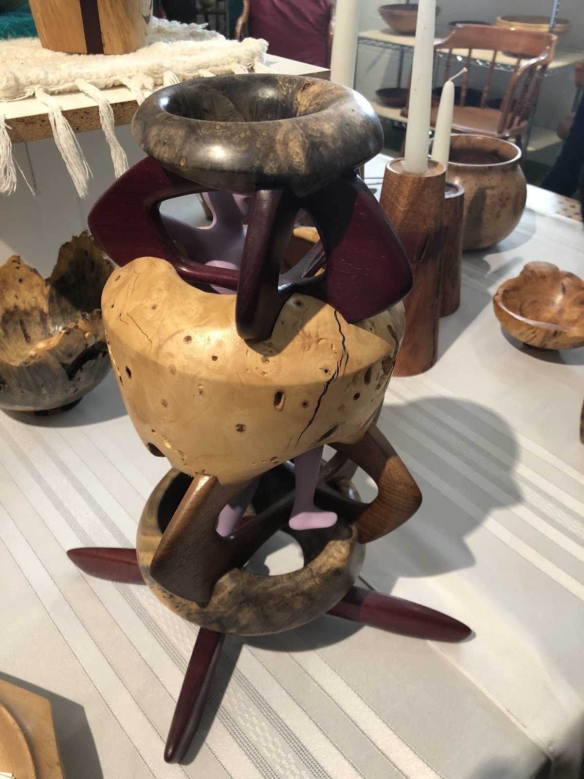 Several turned wood vessels with contrasting tones and natural features
