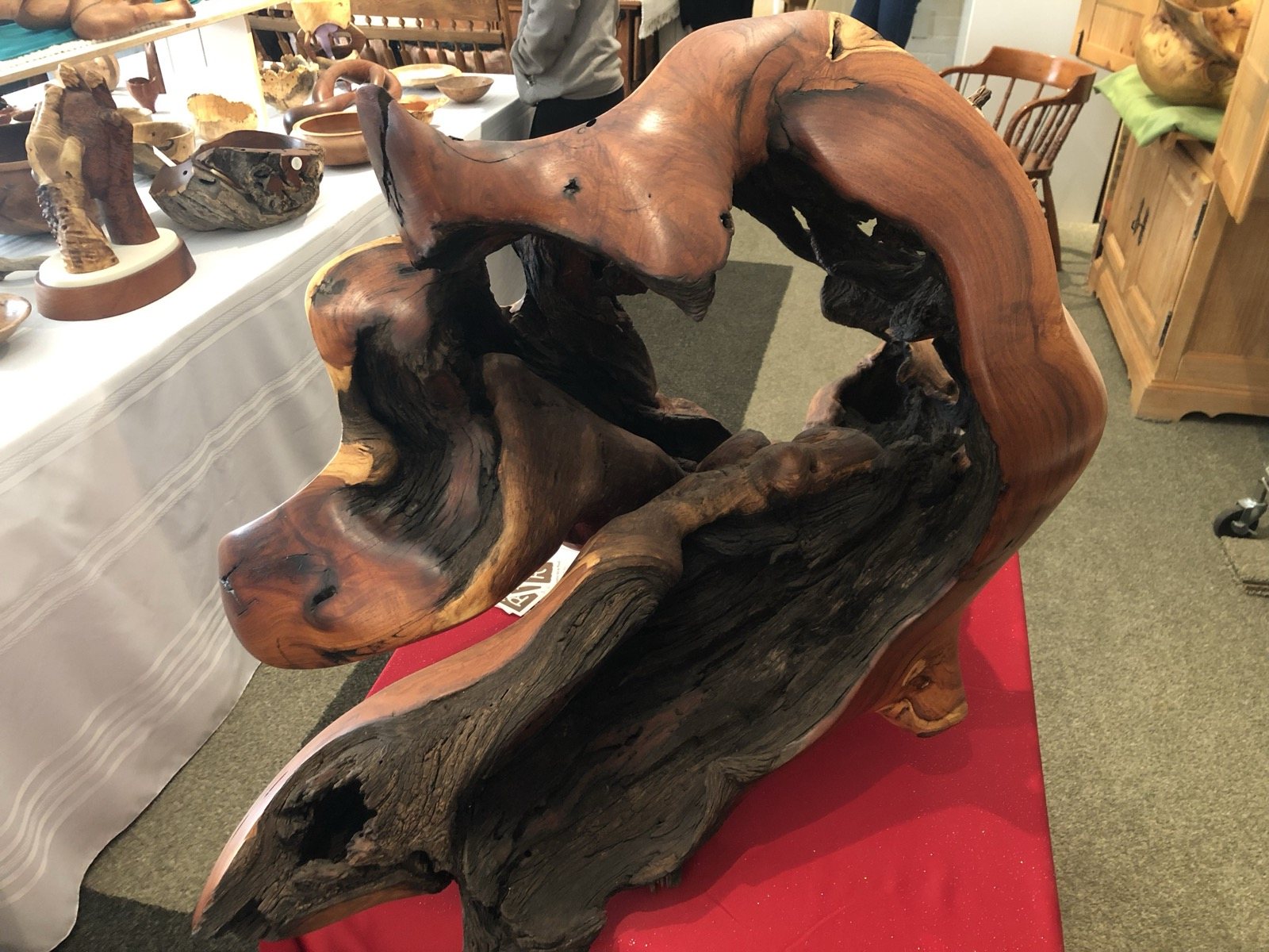 Sculpture with curved interlocking wood forms