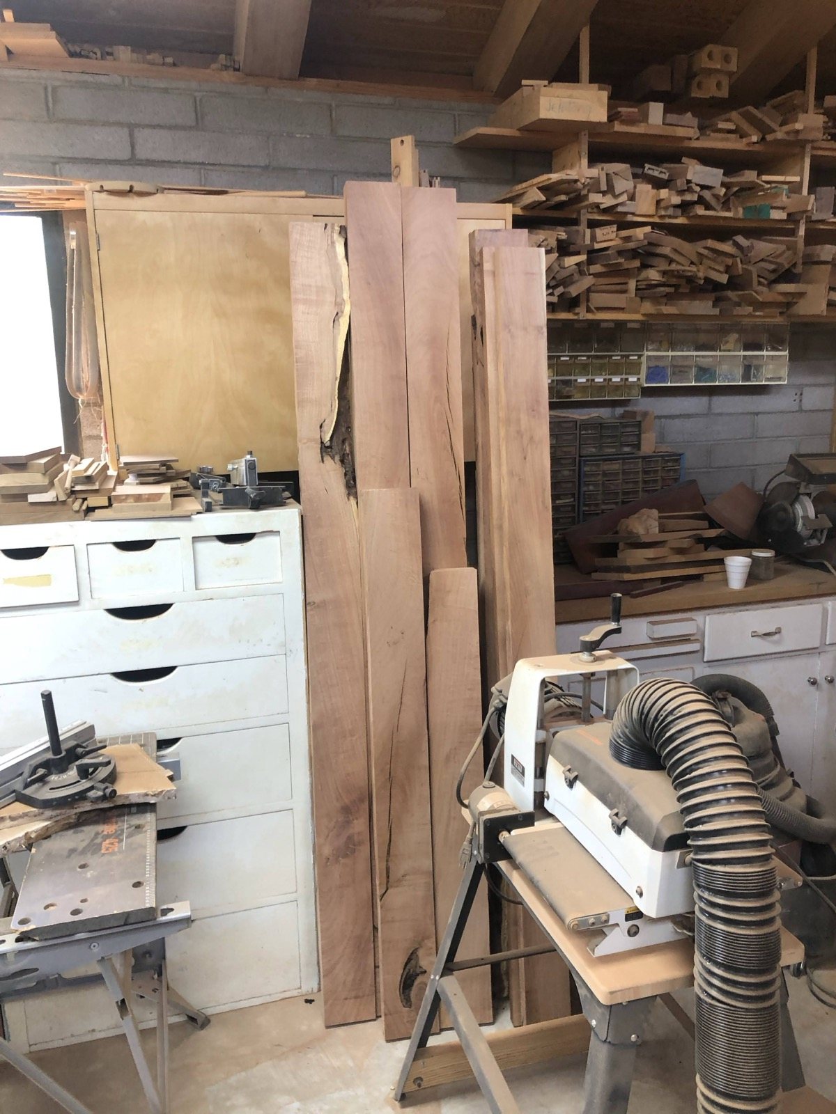 Wood boards and tools arranged in the workshop