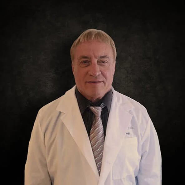 a blue background with white bubbles in the water