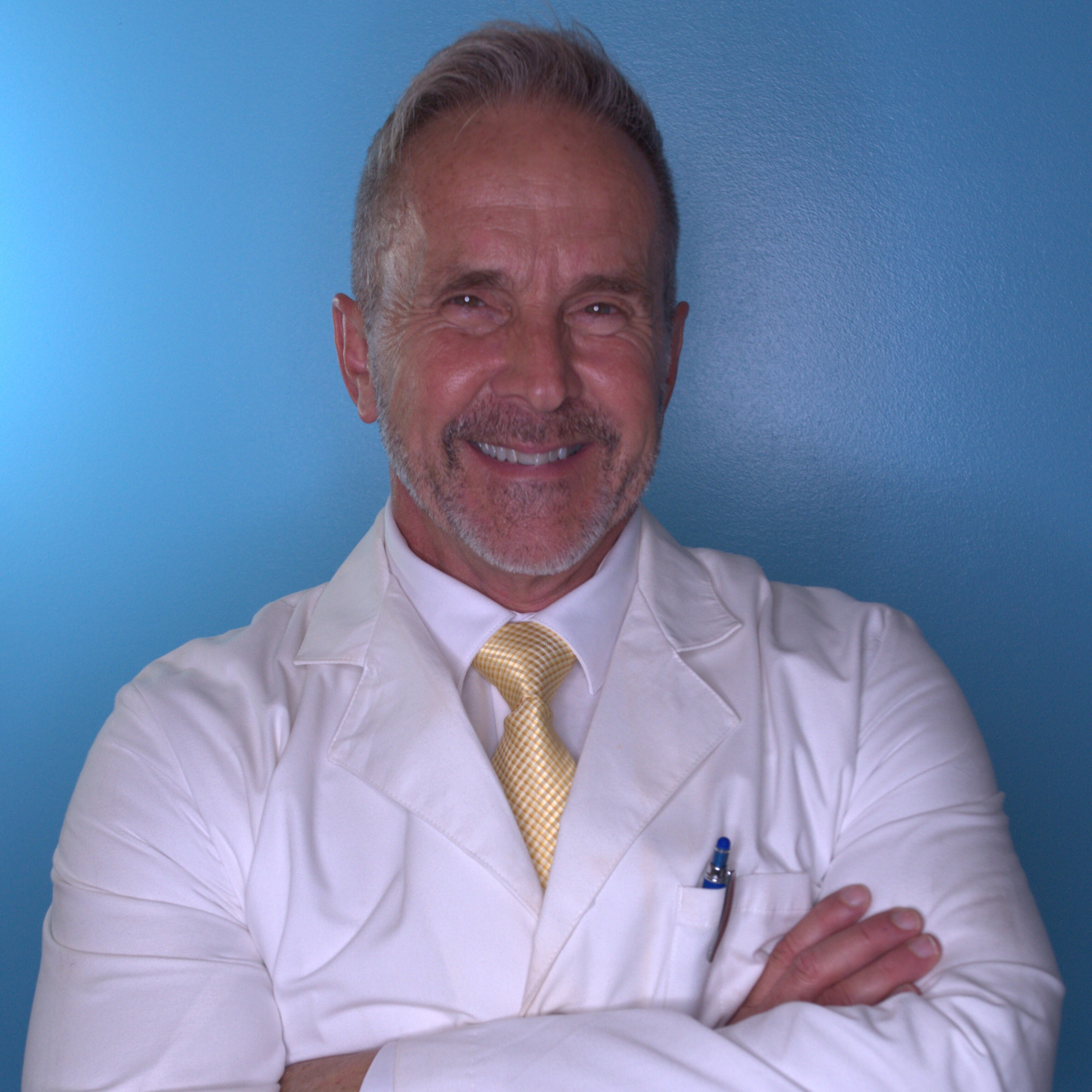 a blue background with white bubbles in the water