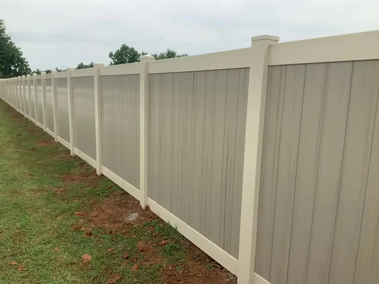 Vinyl Fencing installation by Legacy Fence