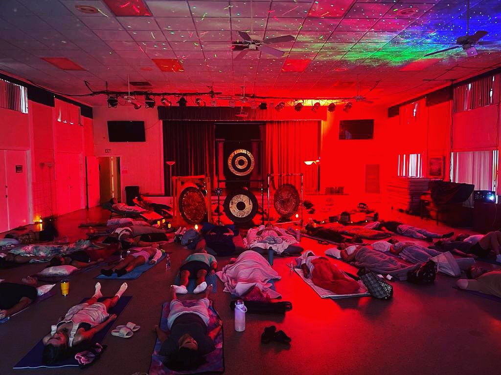 Sound bath session under colored lights
