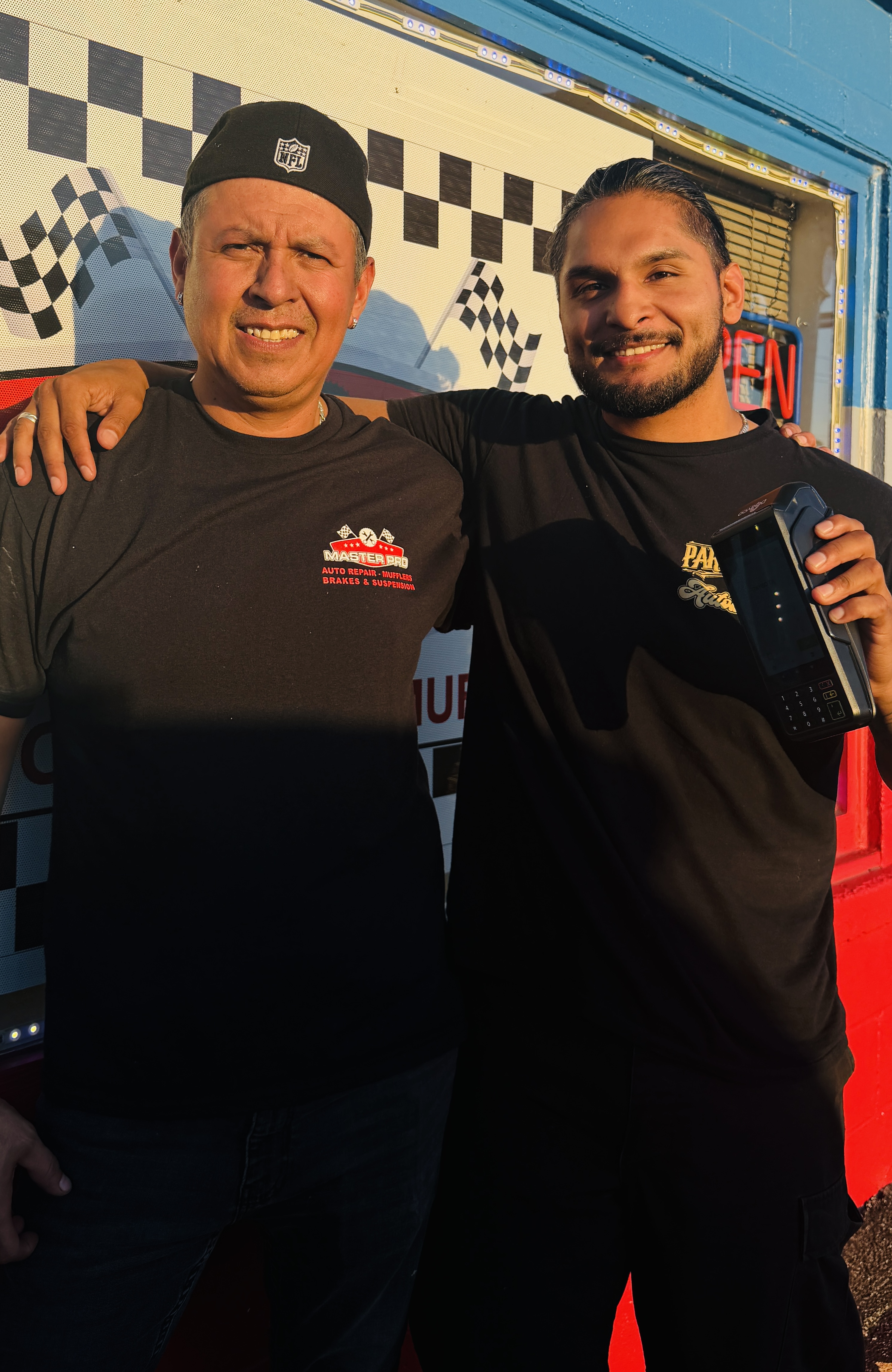 Agustin with the owner of Master Pro Mufflers & Brakes