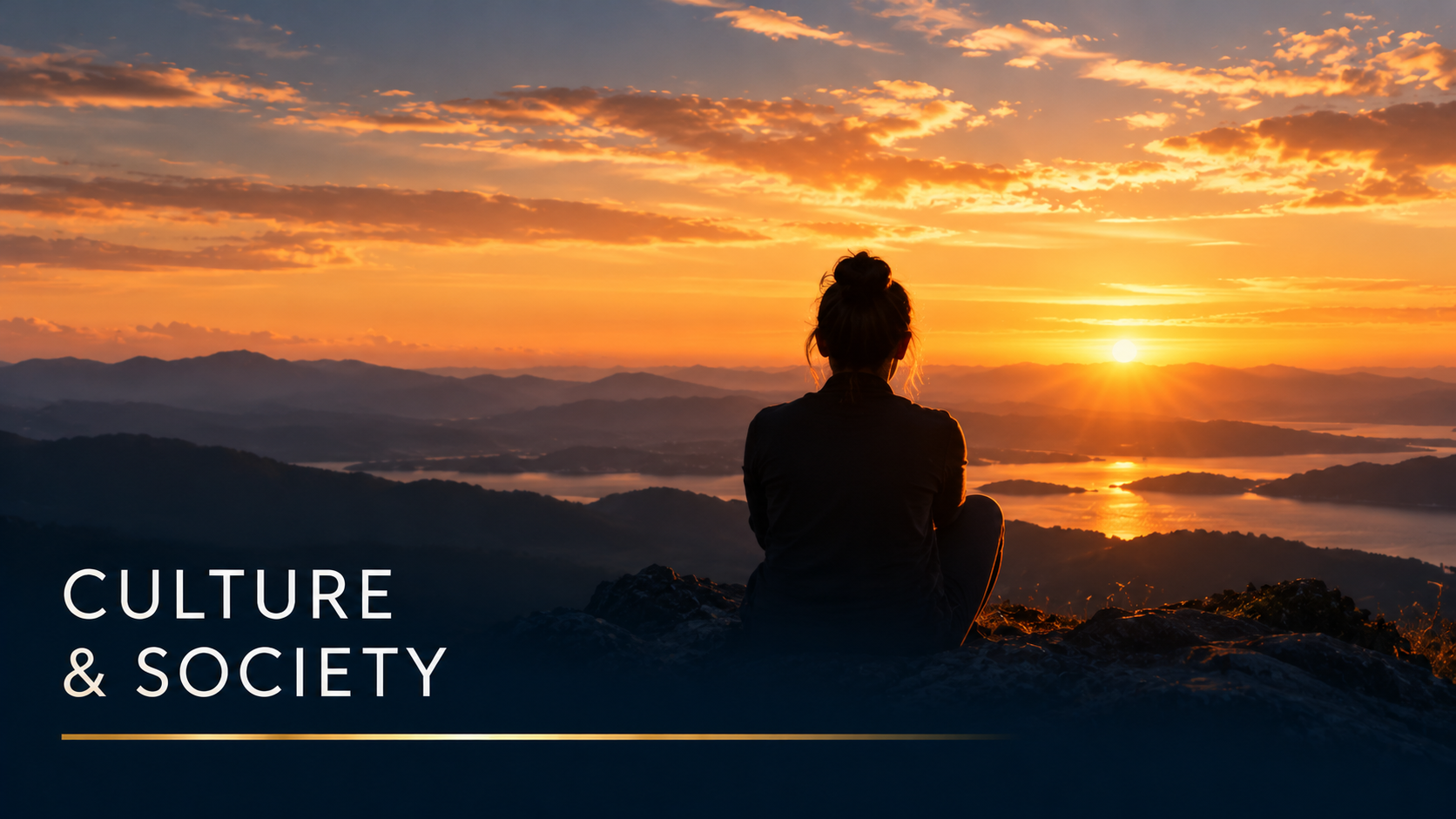 A person meditating at sunset