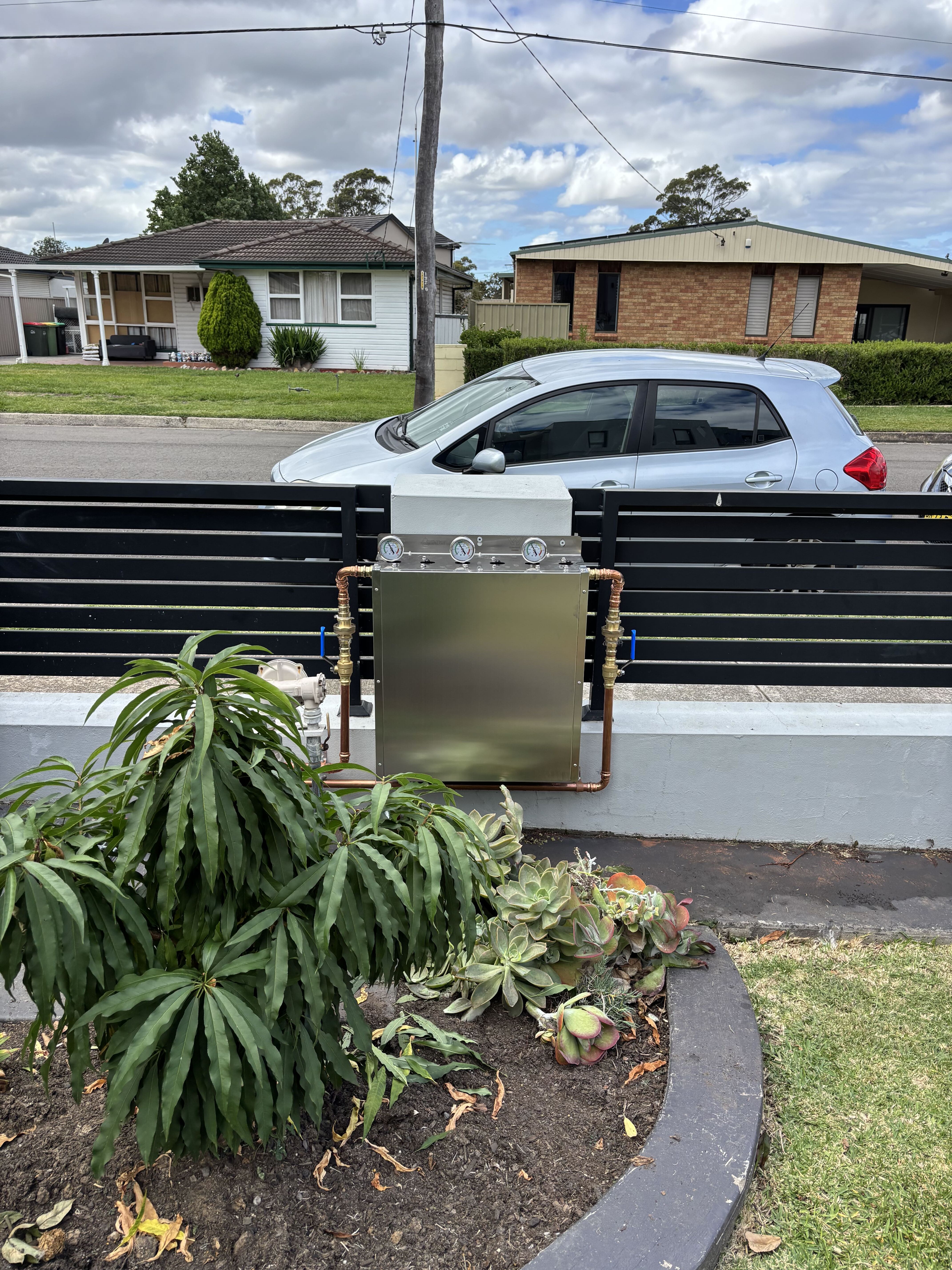 Whole-home water filtration system installed in Northern Beaches front yard