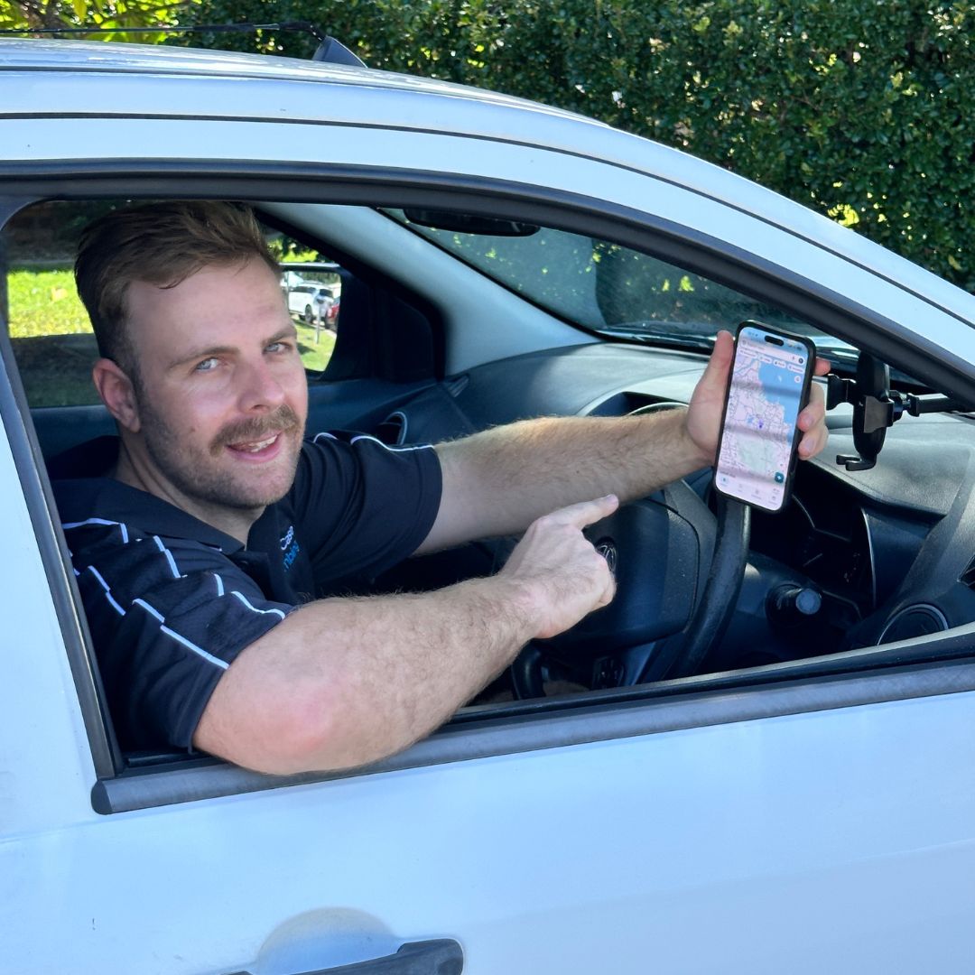 Casey from On The Case Plumbing showing local service areas on a phone map