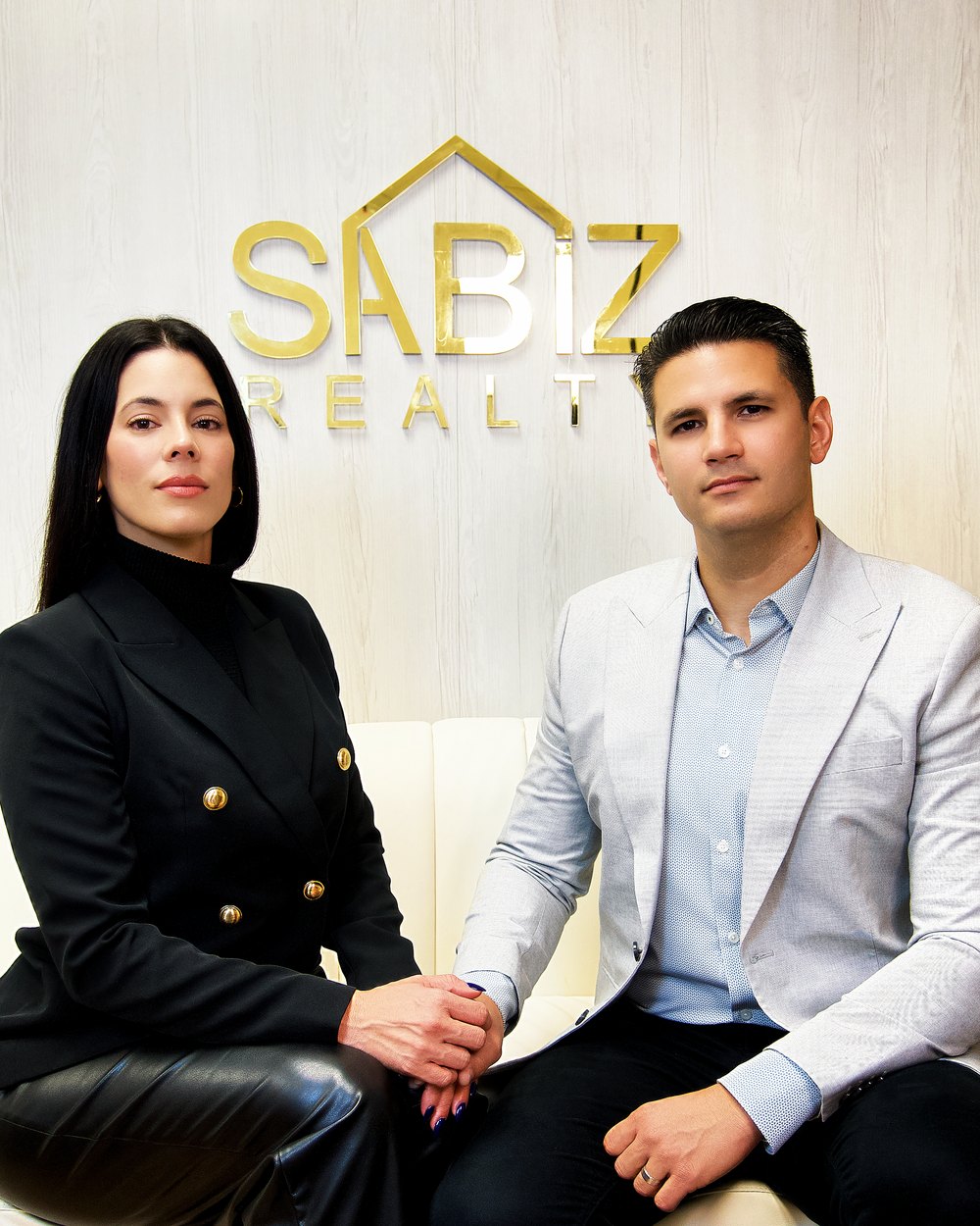 Suamy and Ariel Saavedra, founders of SABIZ Realty