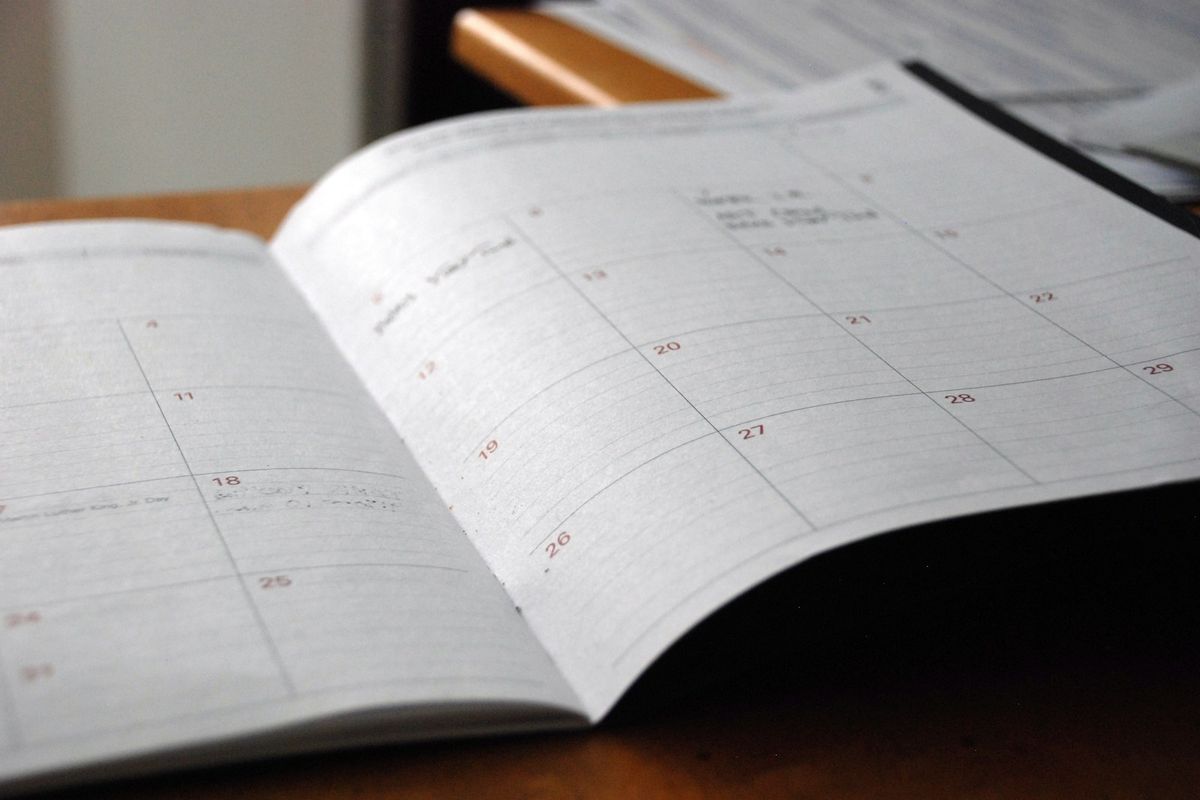An open monthly planner An open monthly planner