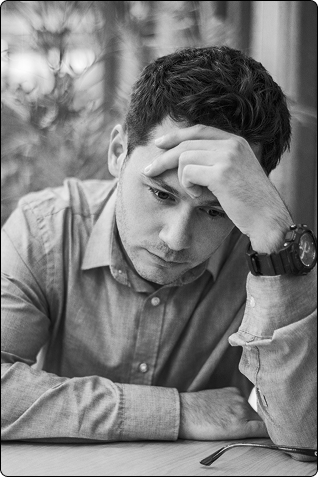 Stressed person looking down