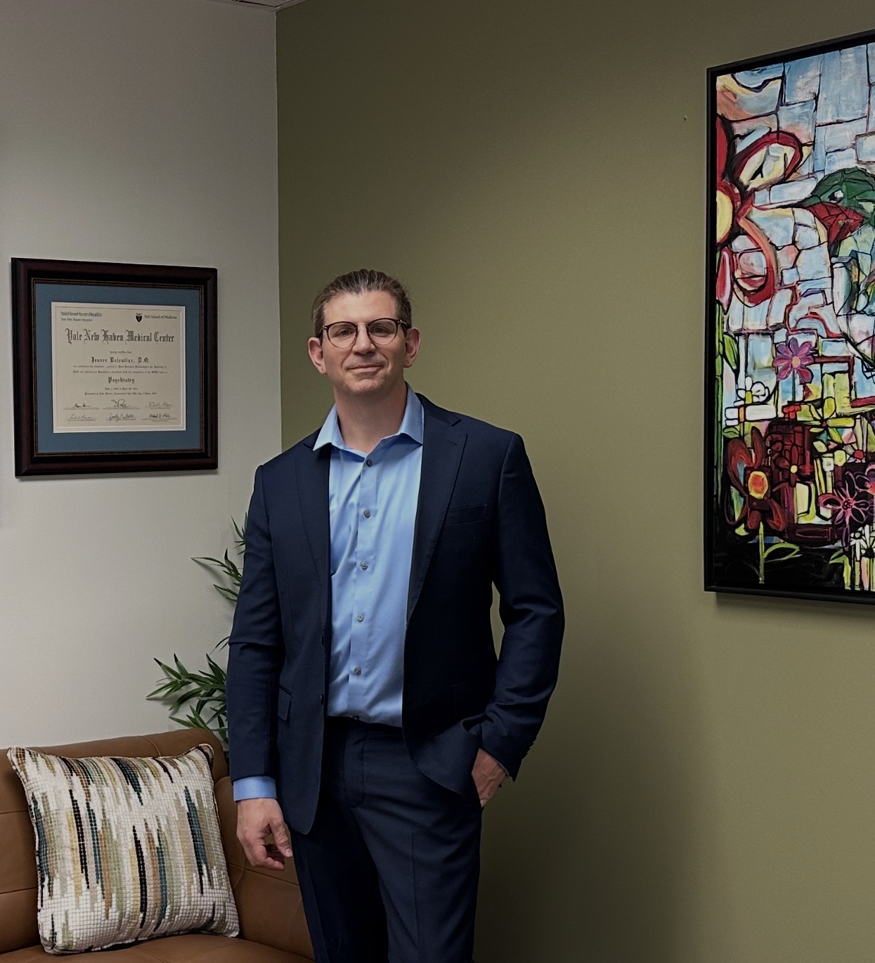 Dr. Jessee Valentine in his office