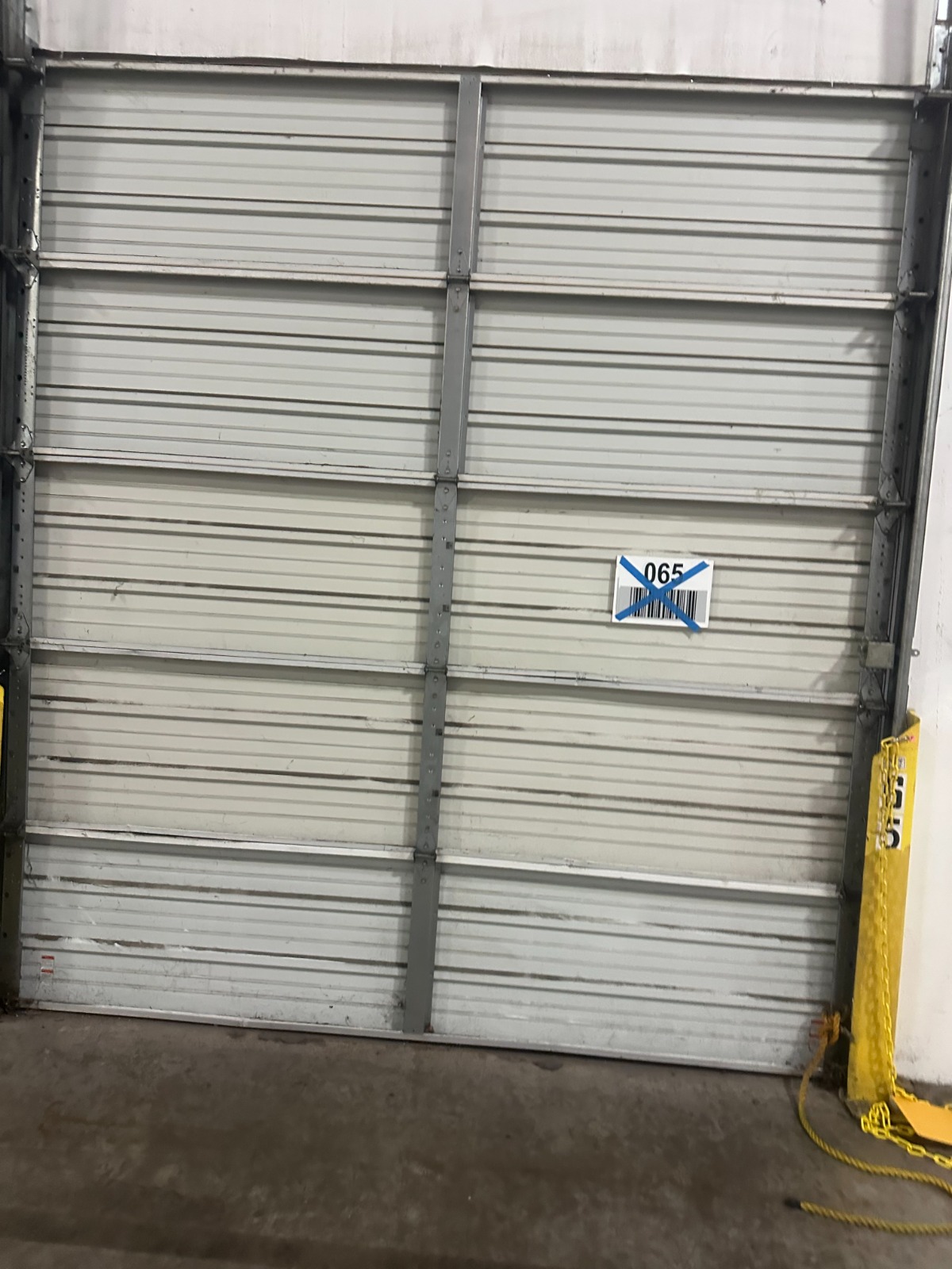 Roll-up door before power washing