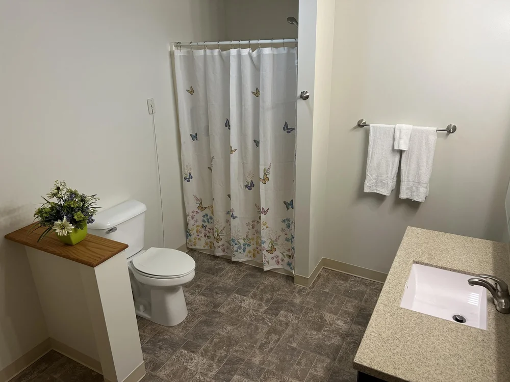 Comfortable senior living suite interior at Bay View Gardens