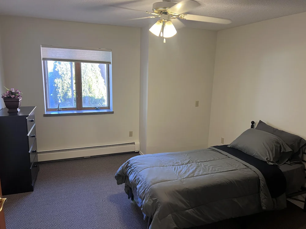 Private bedroom in assisted living apartment at Bay View Gardens