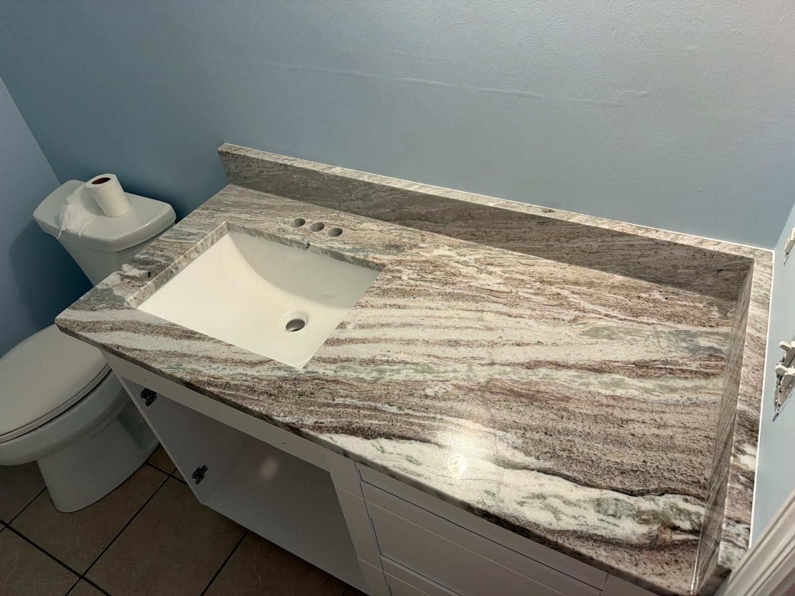 Brown and white granite vanity top