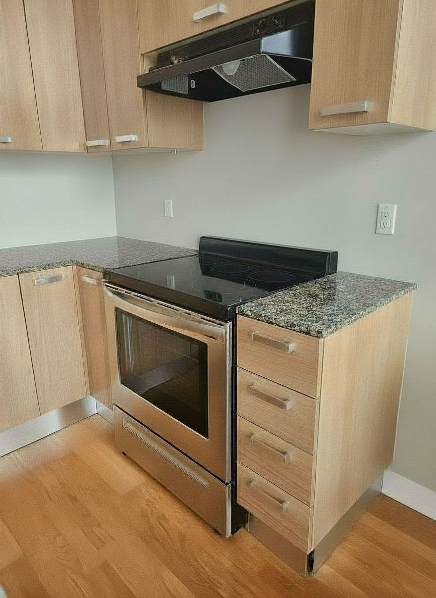Clean kitchen, clutter virtually removed.