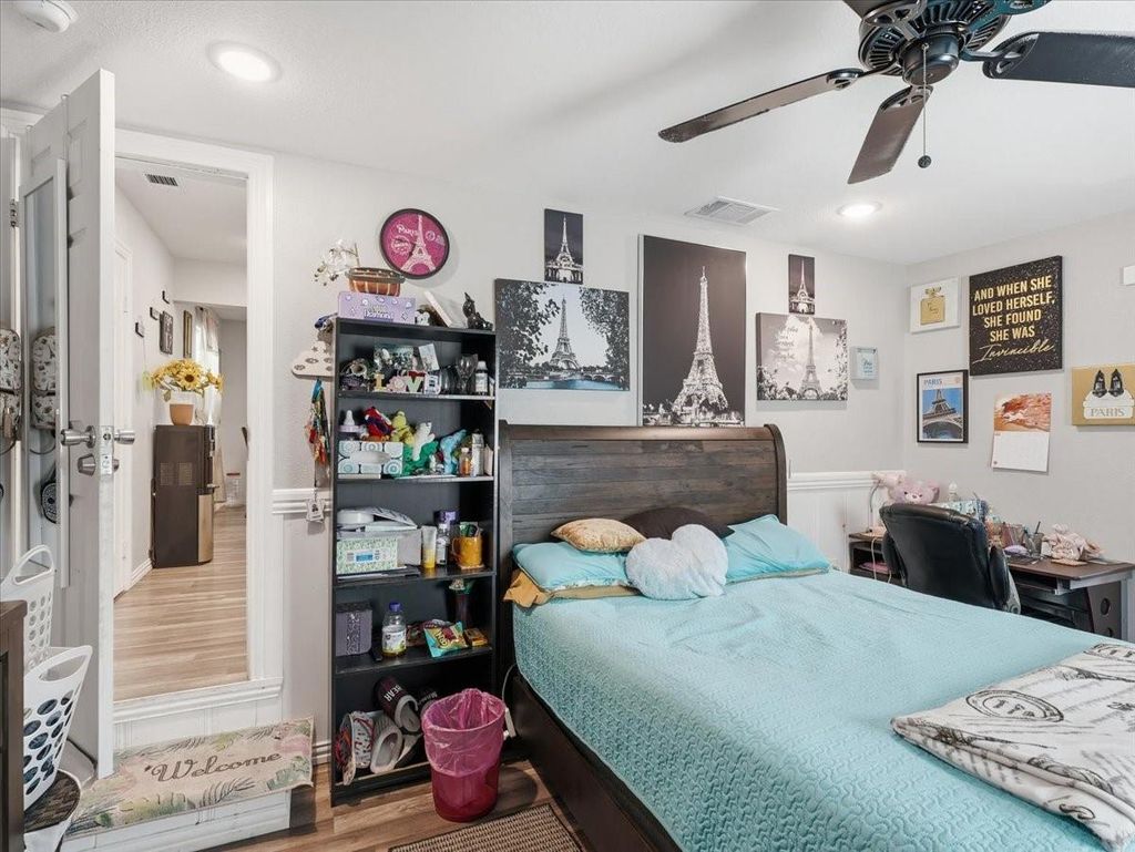 Large level backyard with lush grass