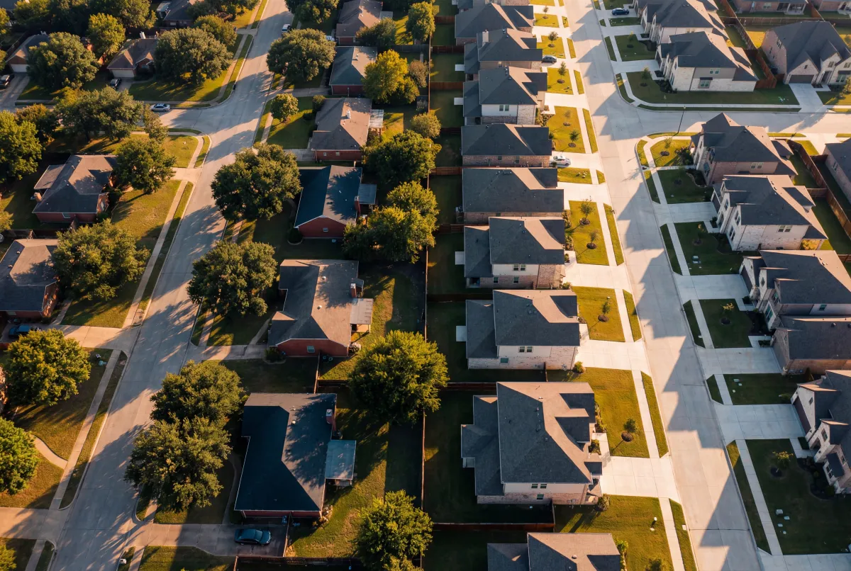 Aerial view comparing two Texas suburban neighborhoods