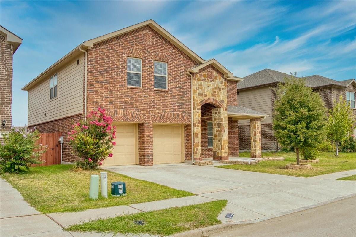 Front of home and driveway