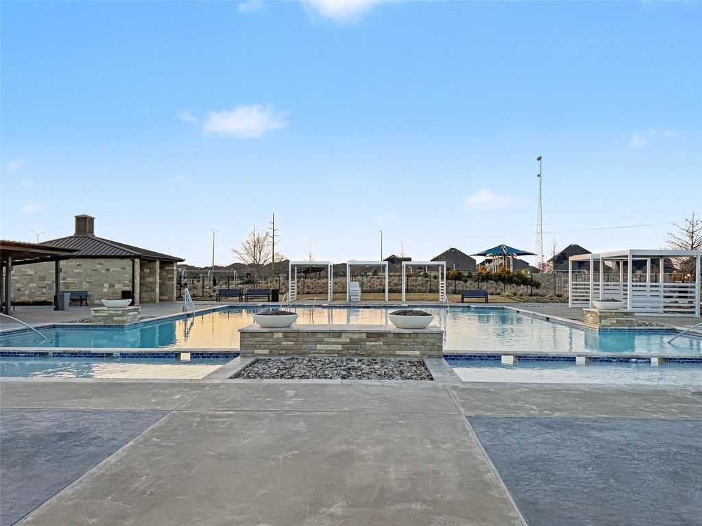 Community resort-style pool with cabanas
