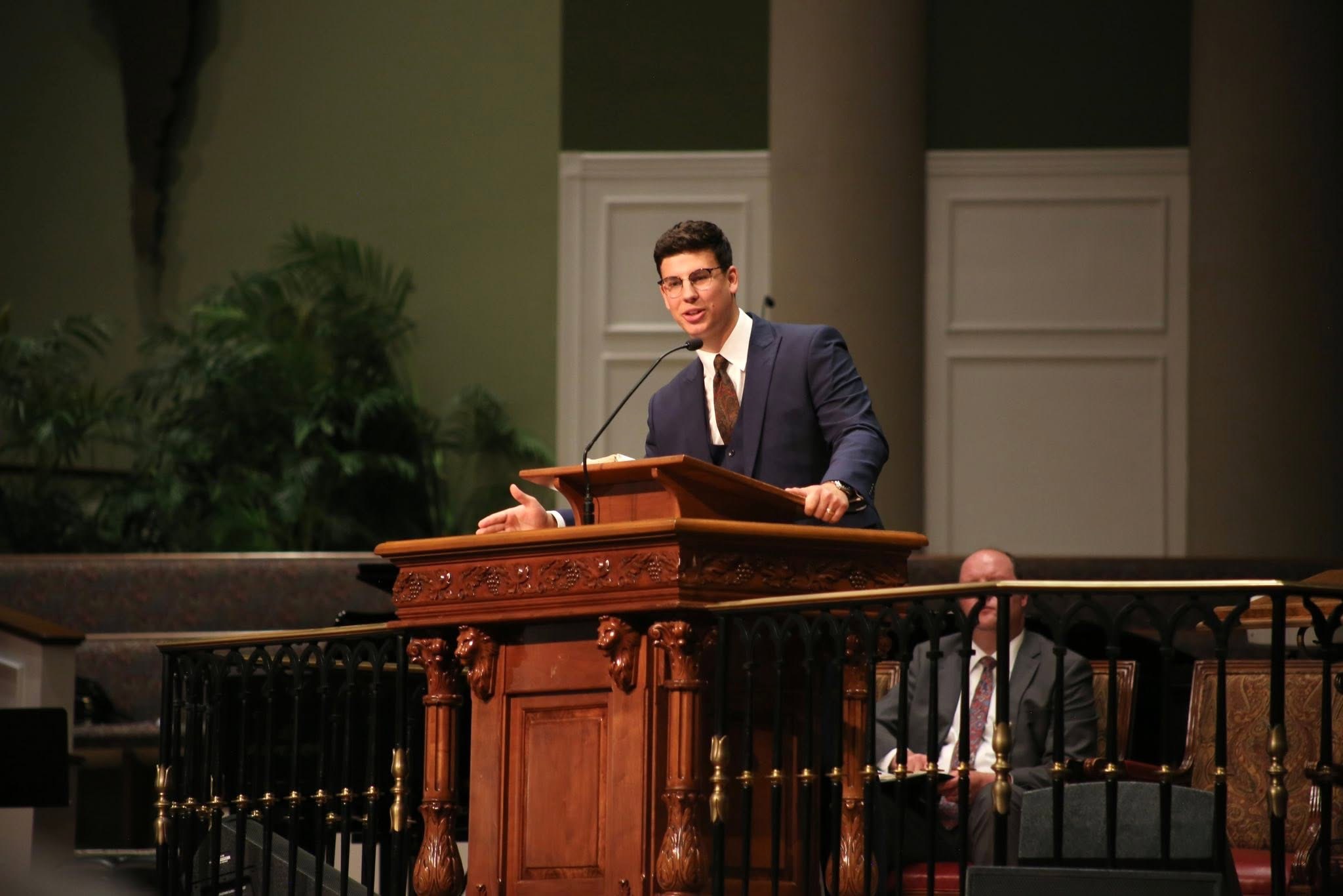 Pastor Zakary Kaplun preaching