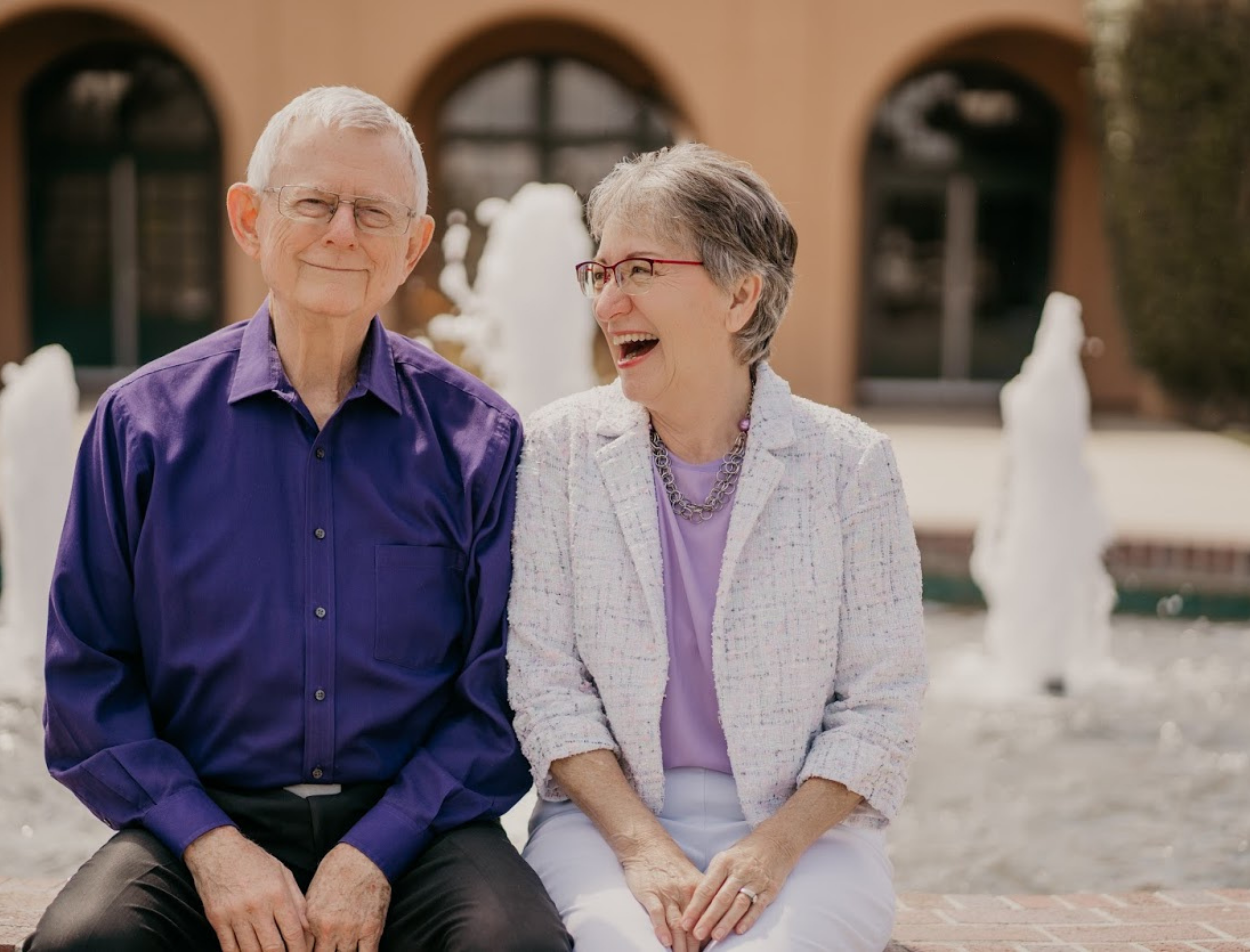 Chuck and Elaine Woodson sharing a genuine laugh together