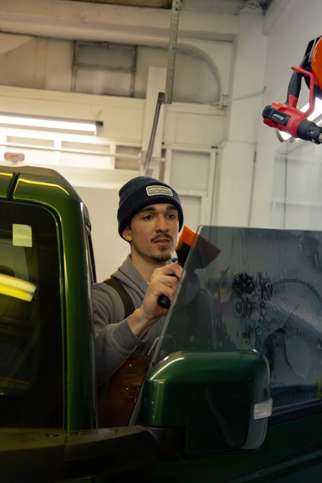 Installing window tint on a pickup truck front door window