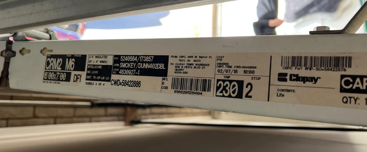 An overhead view of a Clopay warehouse shipping label with various product and shipping details visible.