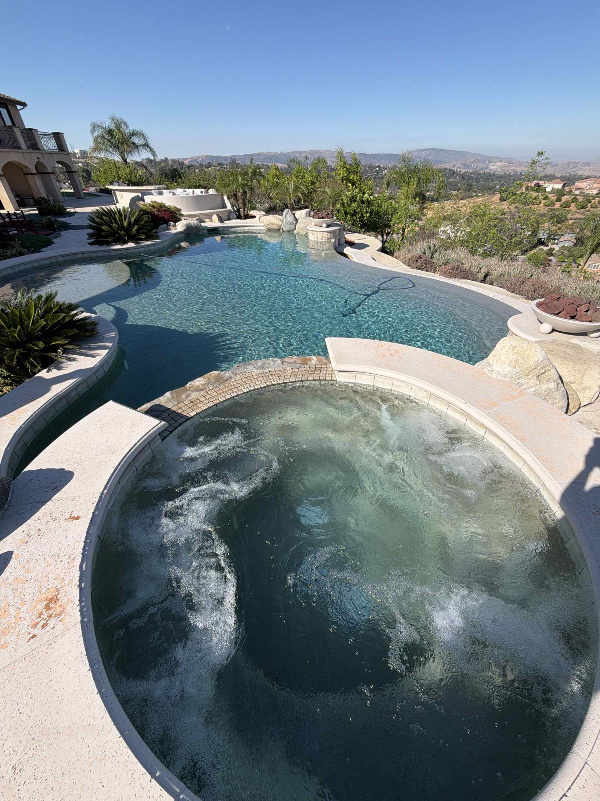Wide shot of a pristine, sparkling pool