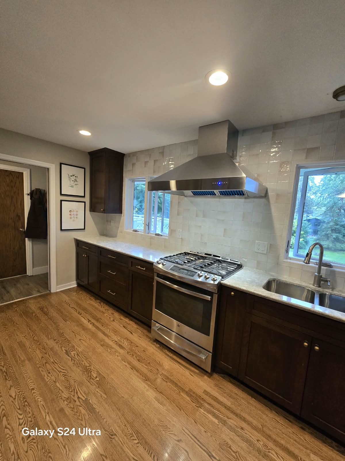 Finished kitchen remodel with custom cabinetry completed by Castro Remodeling & Painting LLC in Minneapolis MN