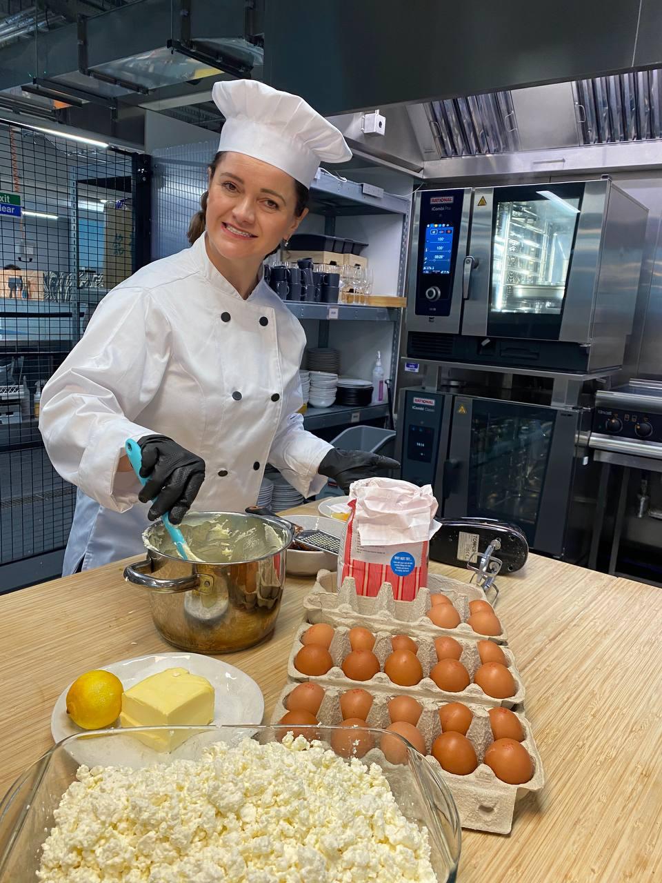 Oksana making syrnky