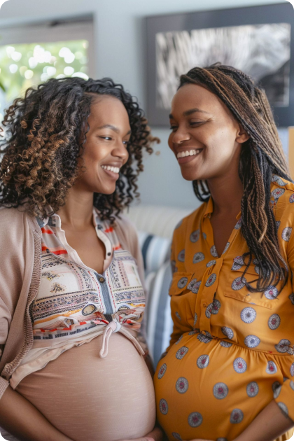Pregnant friends sharing a moment together