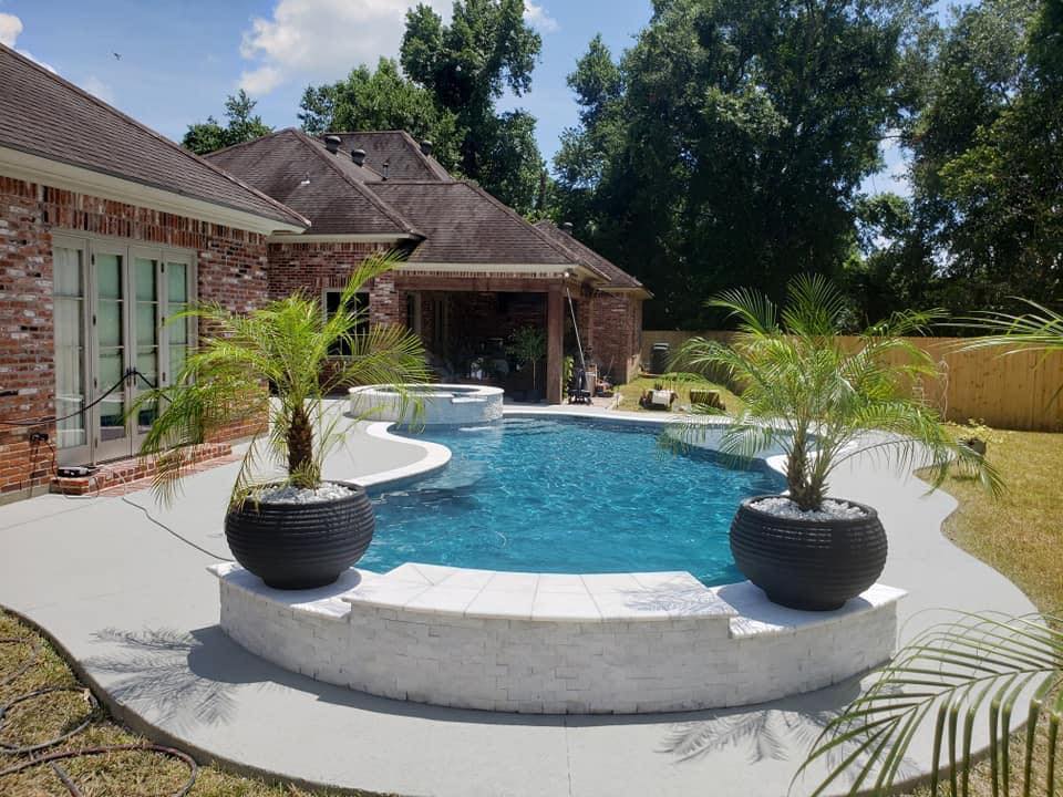 Custom backyard pool and outdoor living space