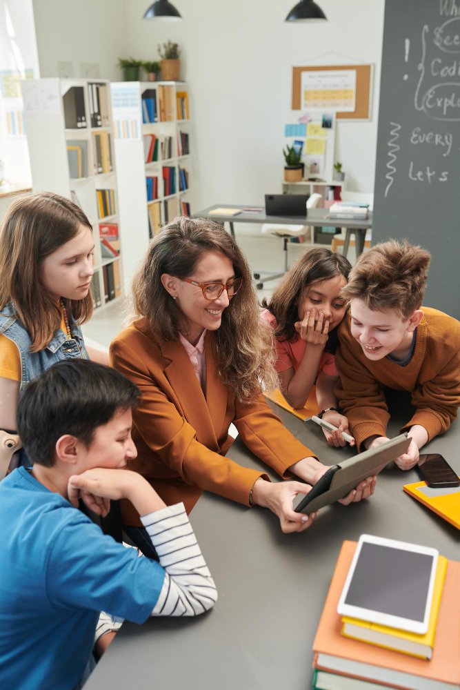 Small group of young students engaged in guided learning activities