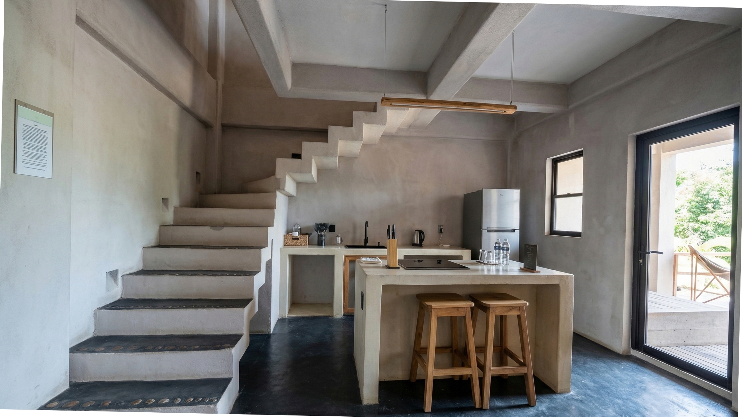 Loft kitchen and staircase to upper-floor bedrooms in the Two-Bedroom Villa — Casa Leah Puerto Escondido, Beach Boutique Hotel 47 steps from Zicatela