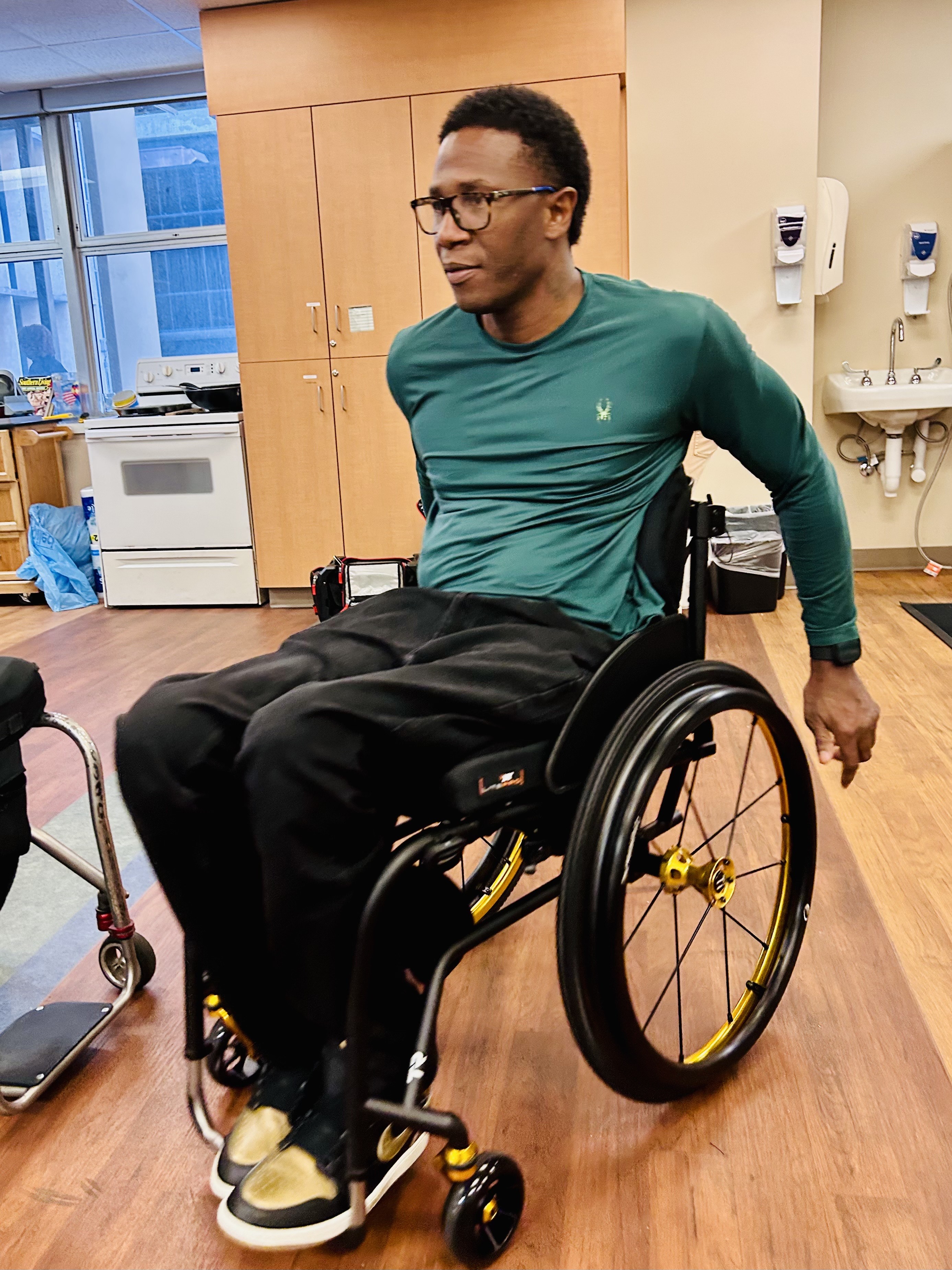 David receives his new TiLite titanium wheelchair