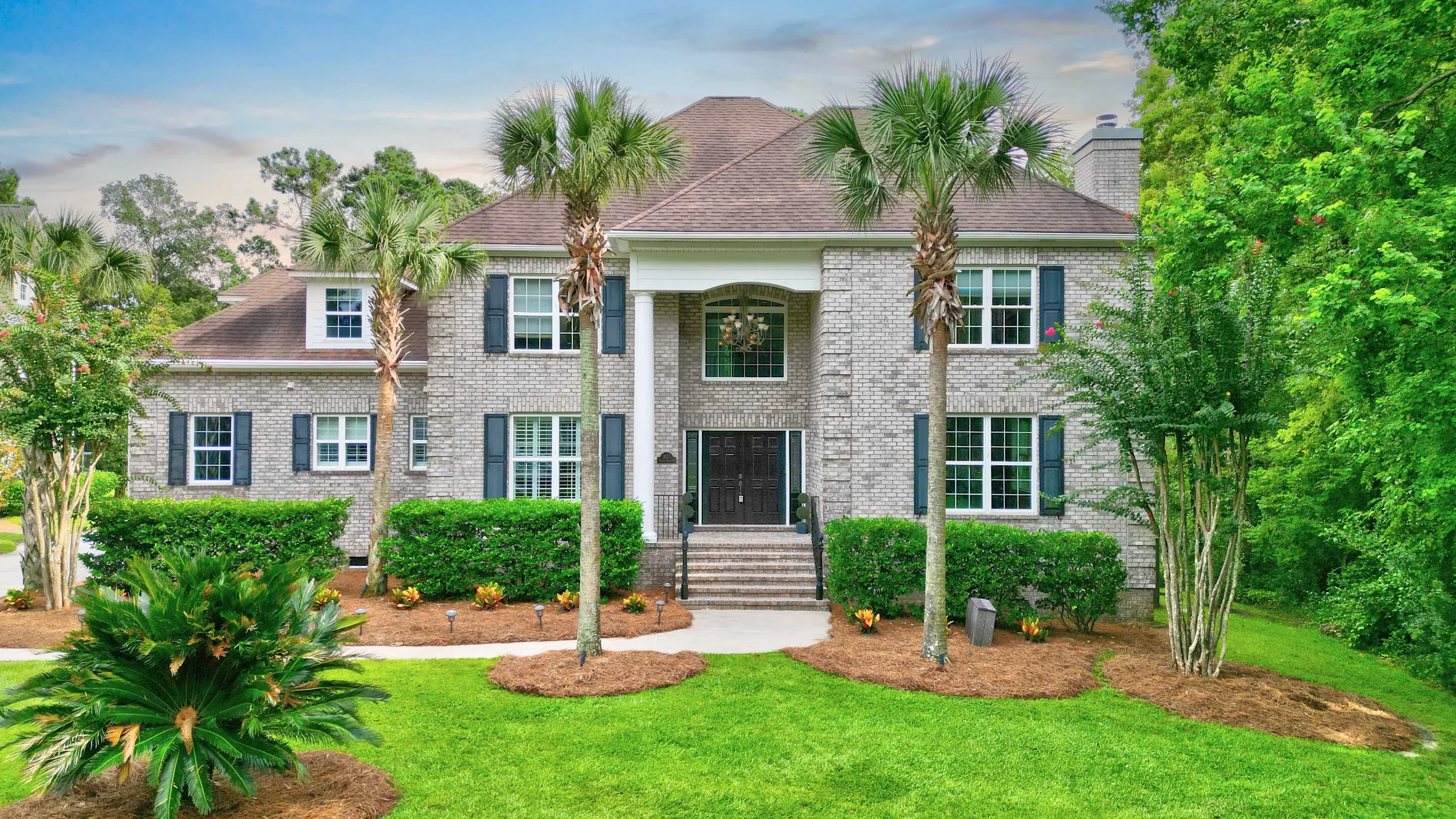 Interior of a bright Charleston-area home with vaulted ceilings and natural light, photographed for a real estate listing