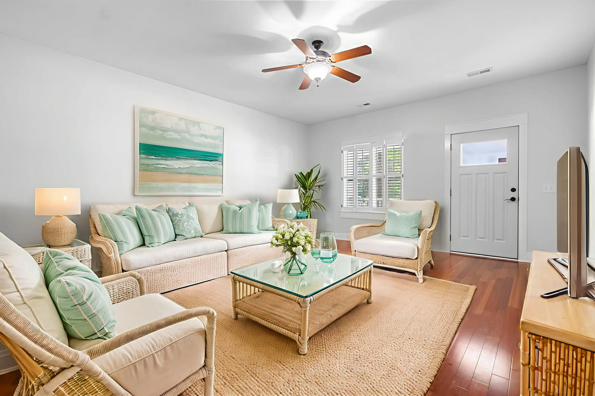 Virtual staging of a furnished living room with neutral tones and natural light