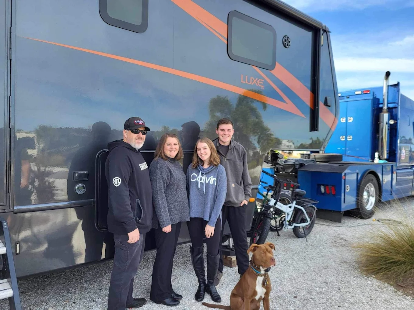 Family on the road with their camper