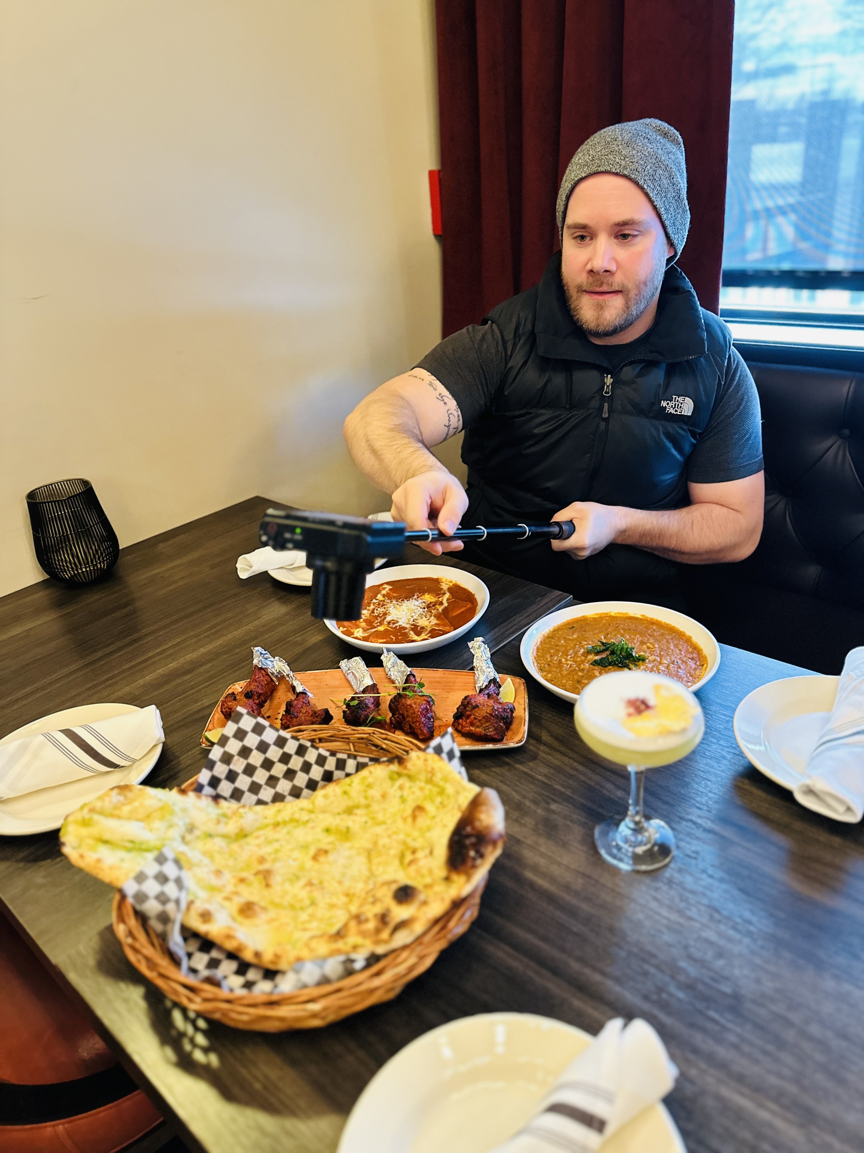 Chris Liddle filming a food shoot on location