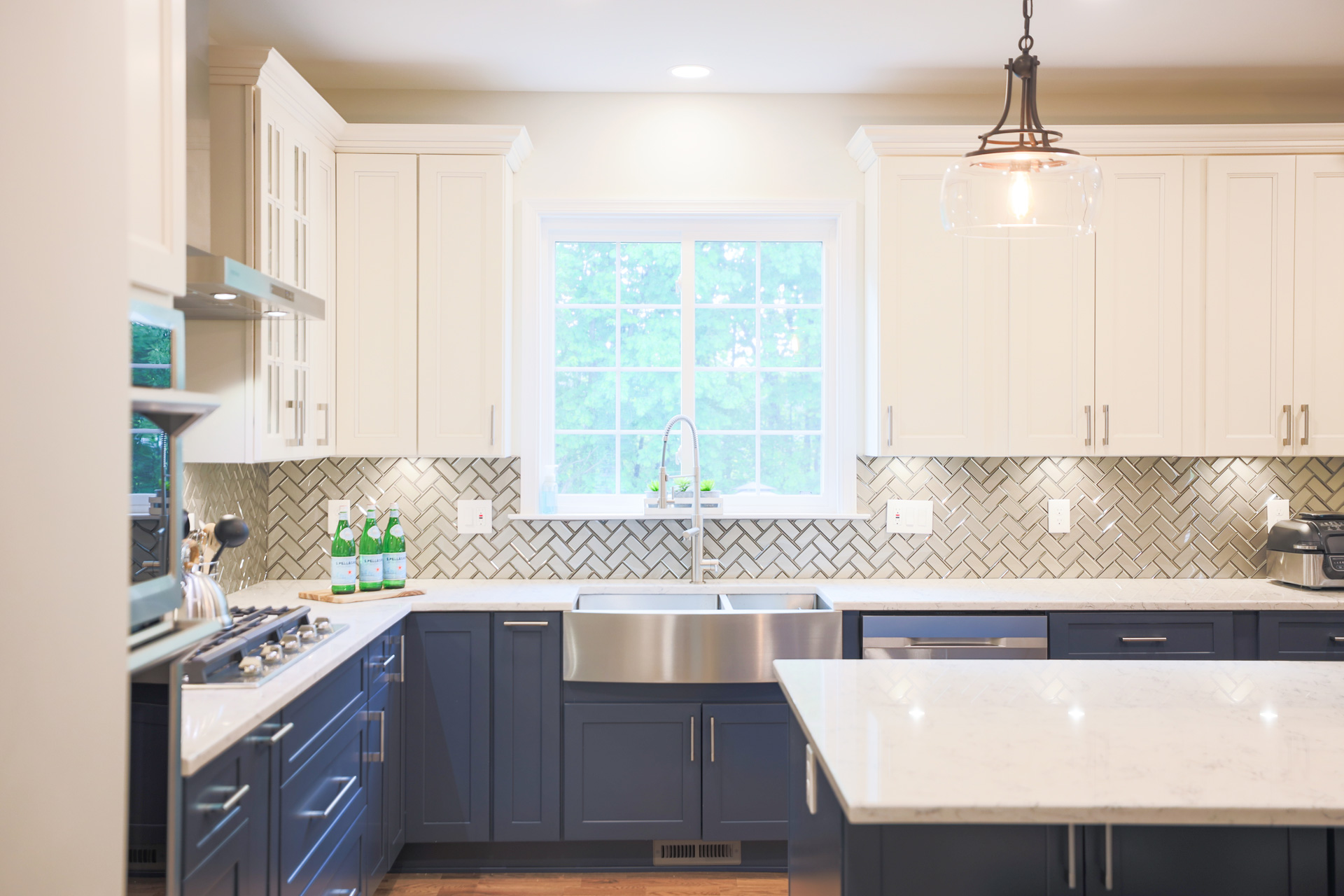 Kitchen remodel contractor consulting with homeowner in a modern kitchen