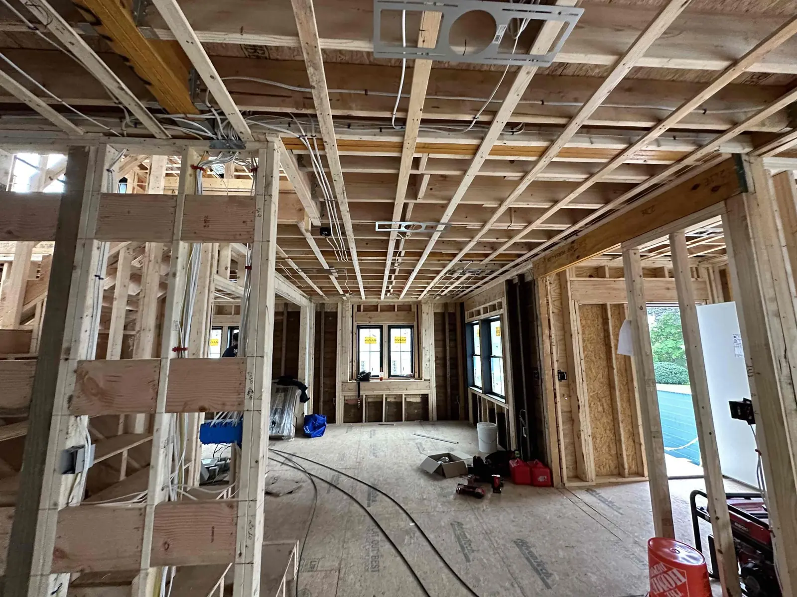 Open framing and exposed ceiling during the remodeling construction stage