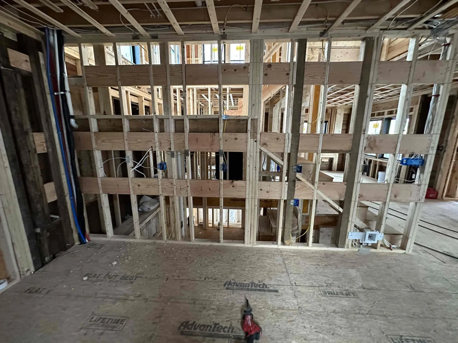 Interior wall framing and electrical rough-in during construction
