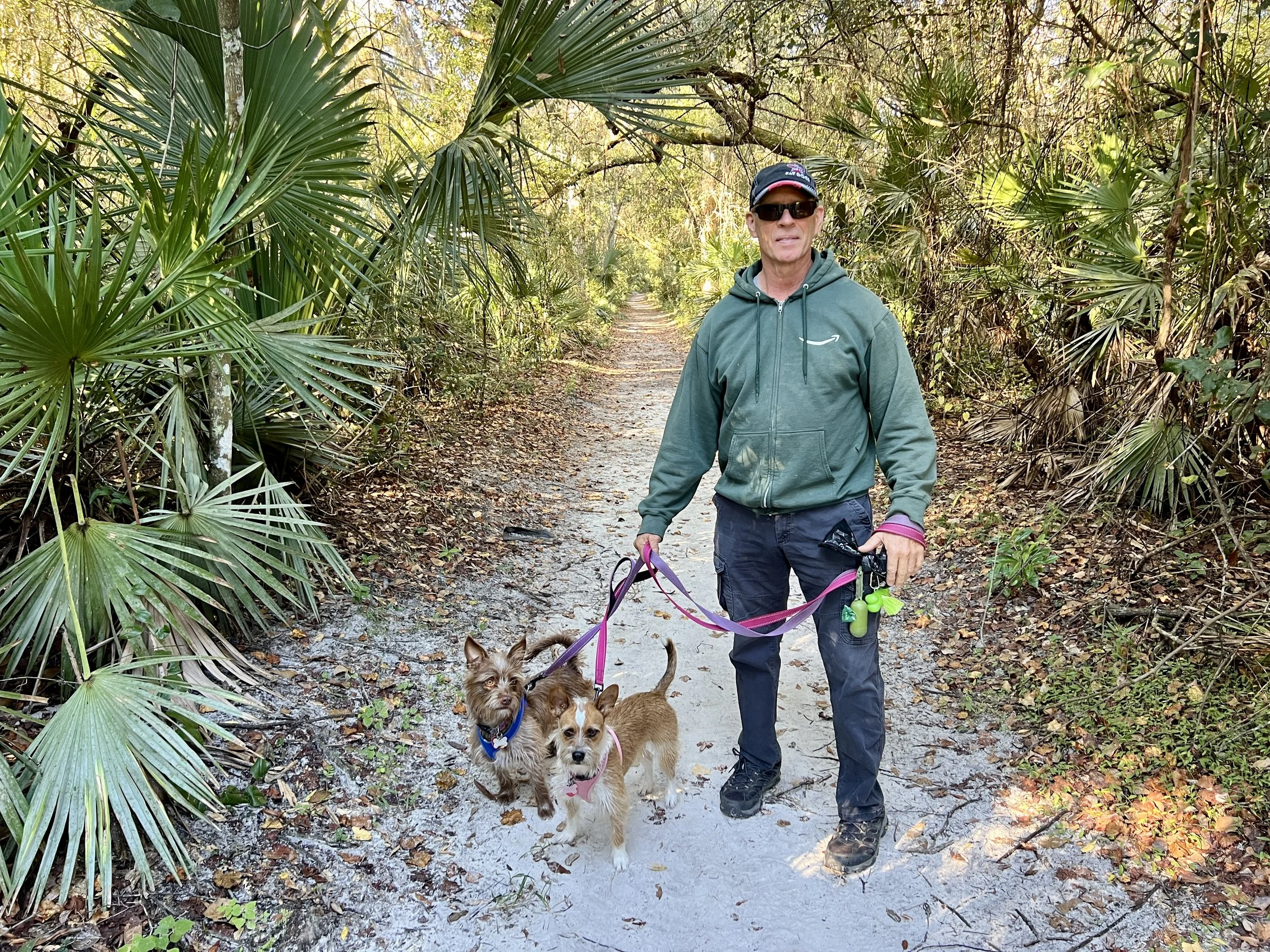 Kevin hiking with the dogs